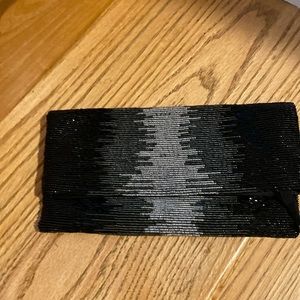 Gorgeous beaded clutch in black, gray and silver with satin interior